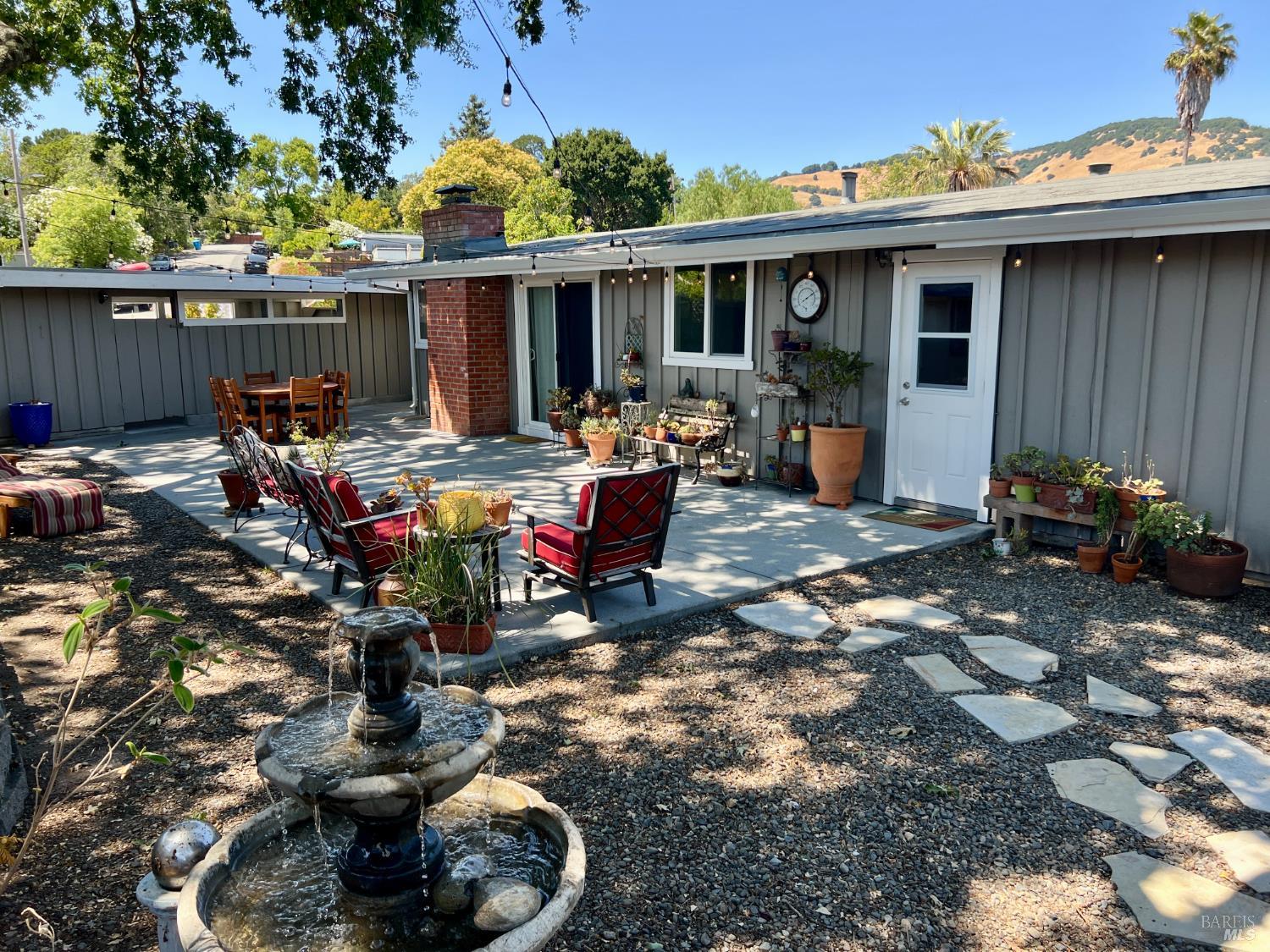 1108 Ferris Drive Novato, CA 94945 - Photo 21 of 24 a view of a chairs and tables in backyard