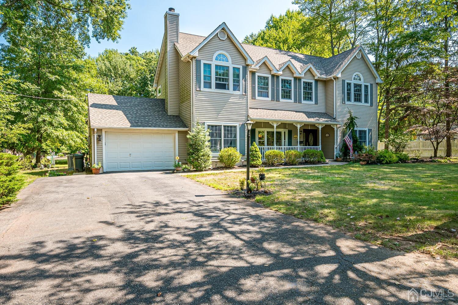27 Homestead Road Edison, NJ 08820 - Photo 1 of 64 a front view of a house with a yard