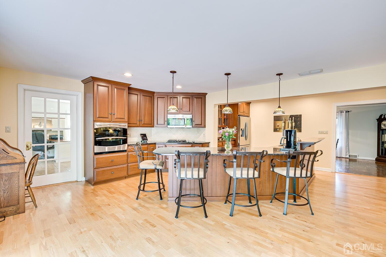 27 Homestead Road Edison, NJ 08820 - Photo 24 of 64 a view of a dining room with furniture window and wooden floor