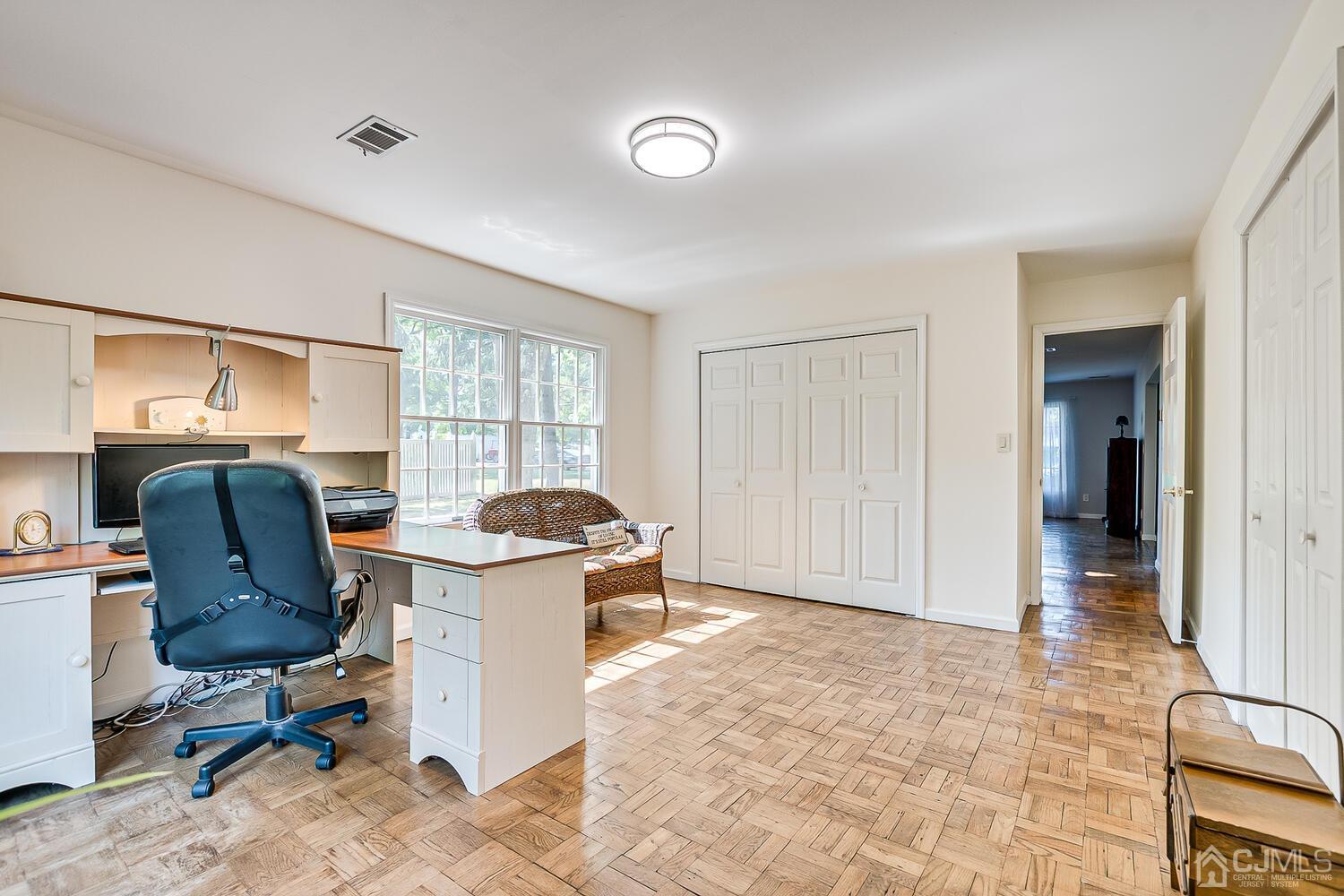 27 Homestead Road Edison, NJ 08820 - Photo 33 of 64 a view of a workspace with furniture and a window