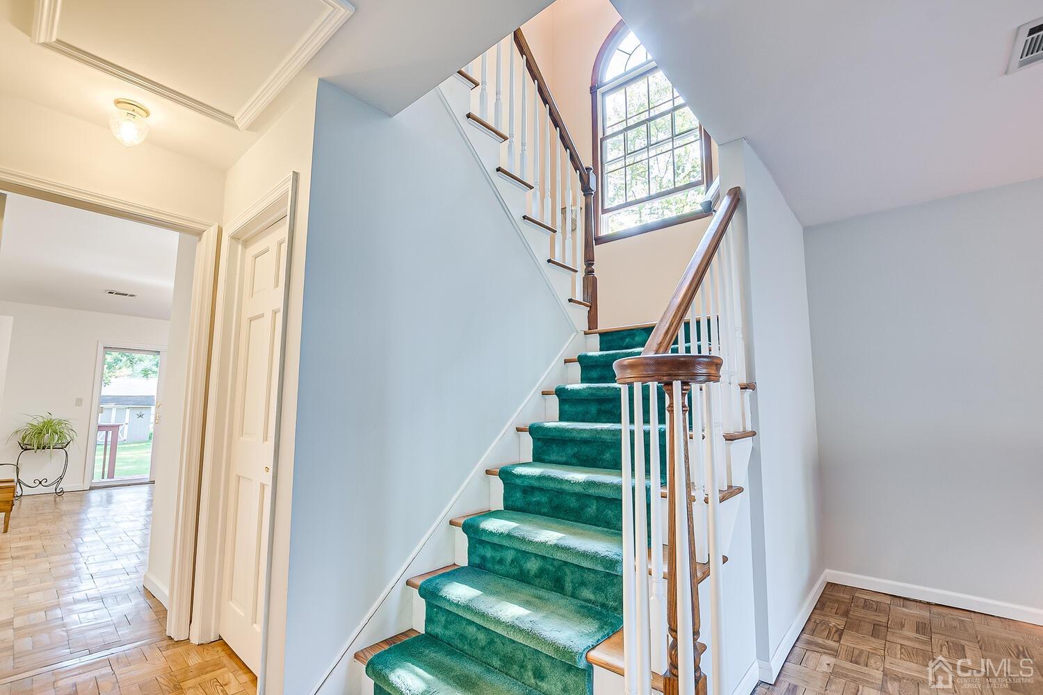 27 Homestead Road Edison, NJ 08820 - Photo 35 of 64 a view of entryway and hall with wooden floor