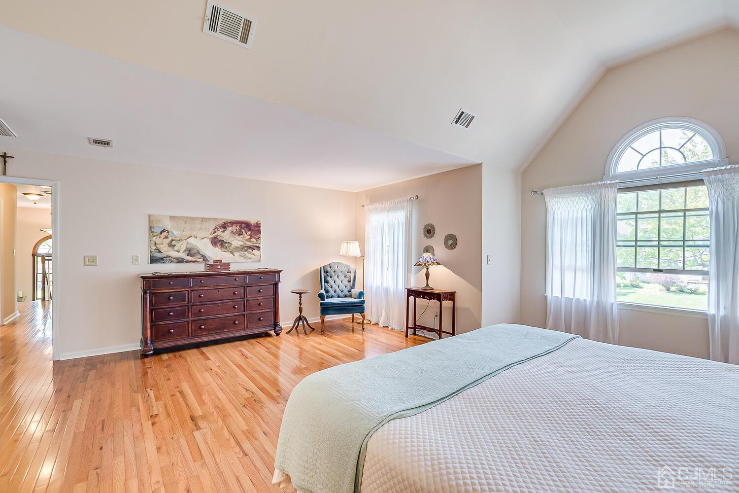27 Homestead Road Edison, NJ 08820 - Photo 40 of 64 a bedroom with a bed and a dresser