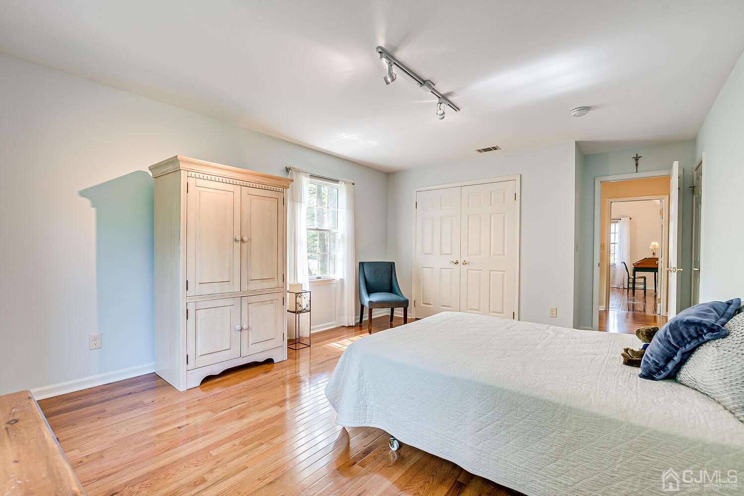 27 Homestead Road Edison, NJ 08820 - Photo 50 of 64 a bedroom with a bed and a window