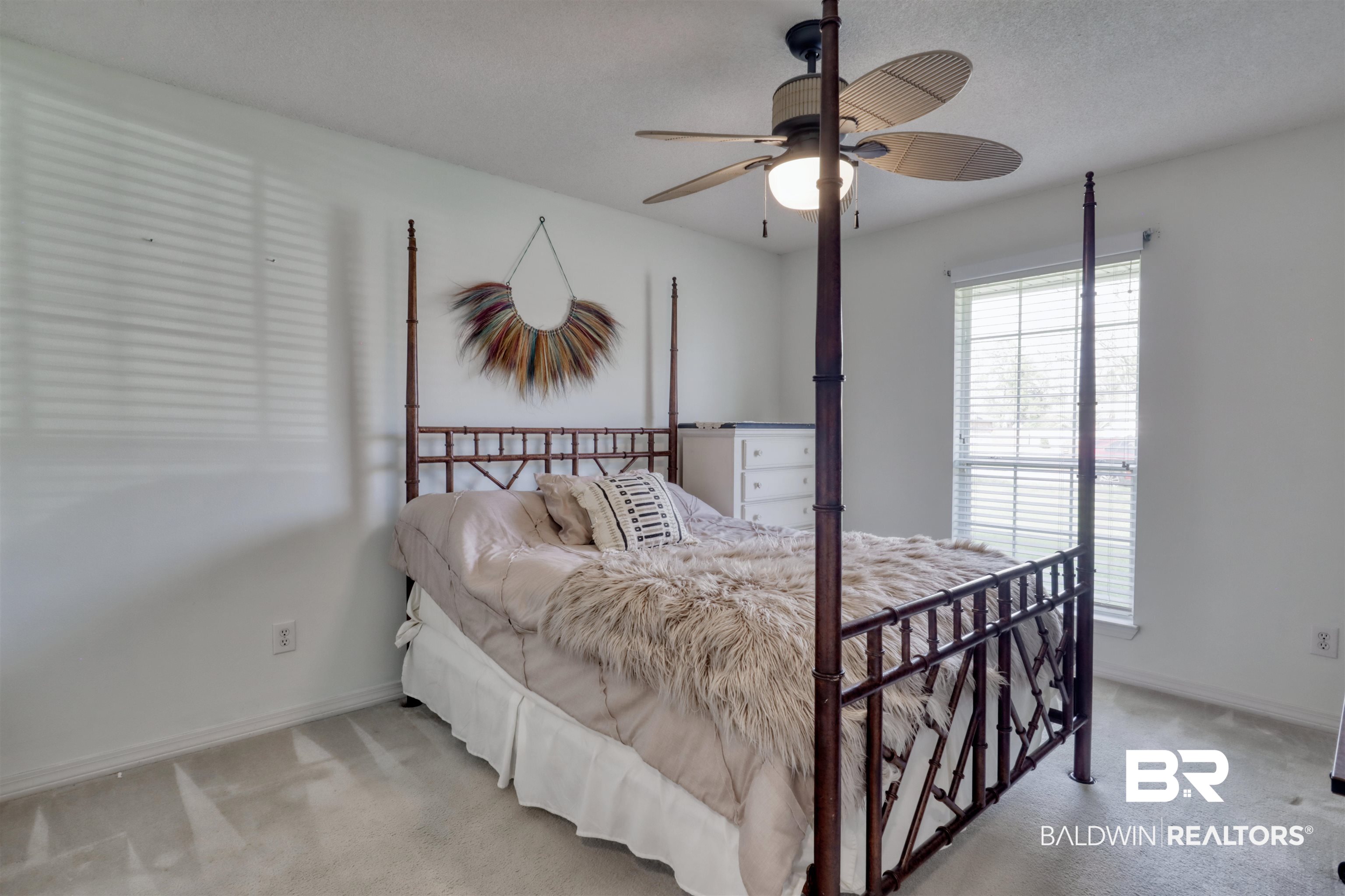 12893 Hunters Chase Foley, AL 36535 - Photo 32 of 42 Carpeted bedroom featuring baseboards and a ceiling fan
