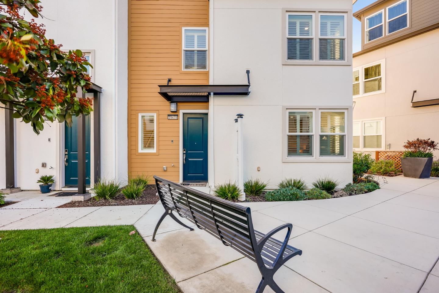 39478 Capstone Common Fremont, CA 94539 - Photo 2 of 33 a front view of a house with a yard