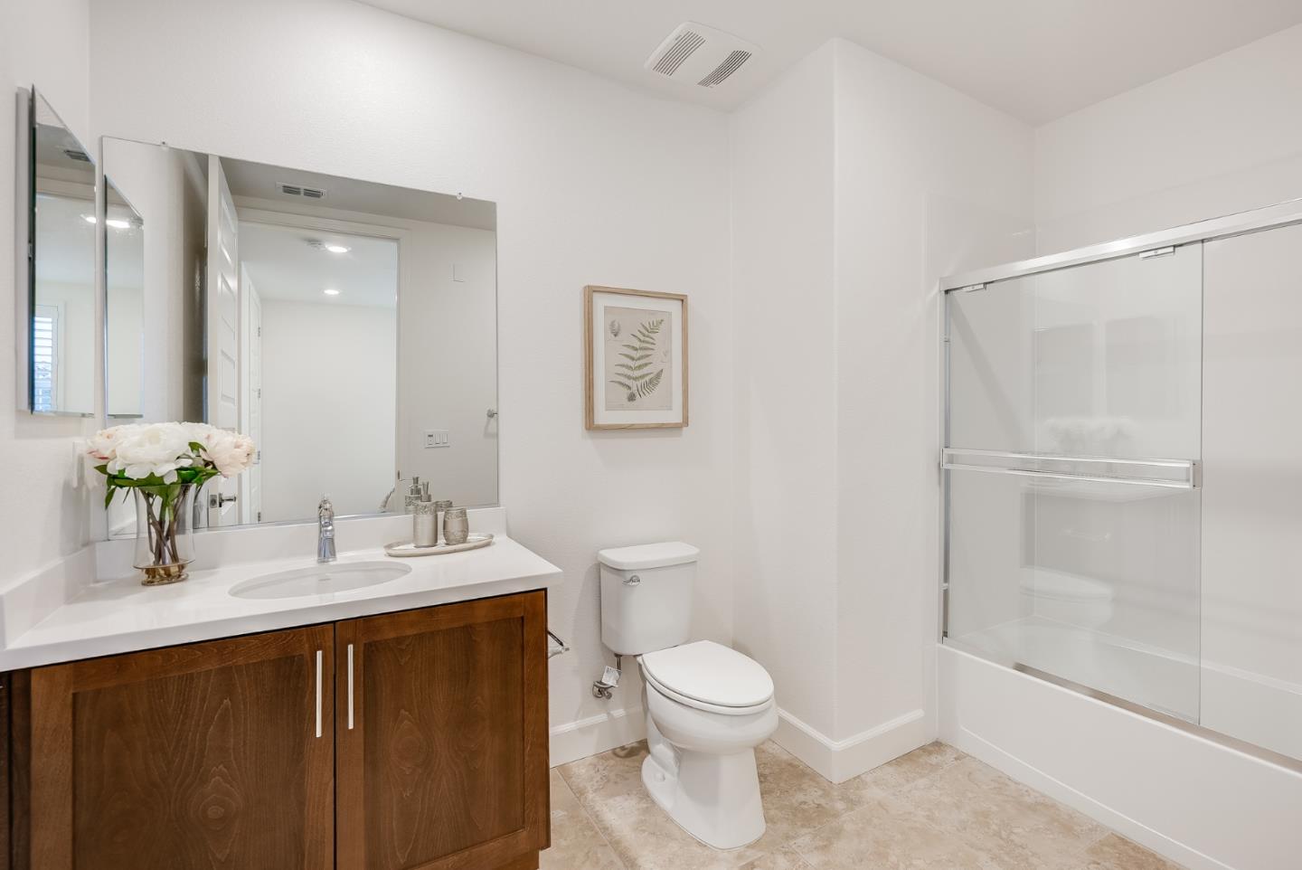 39478 Capstone Common Fremont, CA 94539 - Photo 24 of 33 a bathroom with a sink a toilet and shower