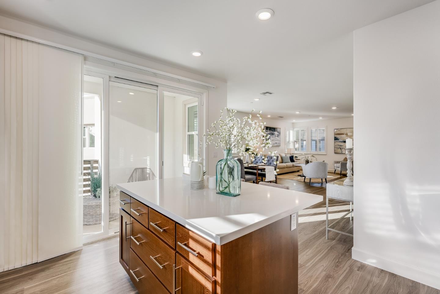 39478 Capstone Common Fremont, CA 94539 - Photo 5 of 33 a kitchen with stainless steel appliances granite countertop a sink and a refrigerator