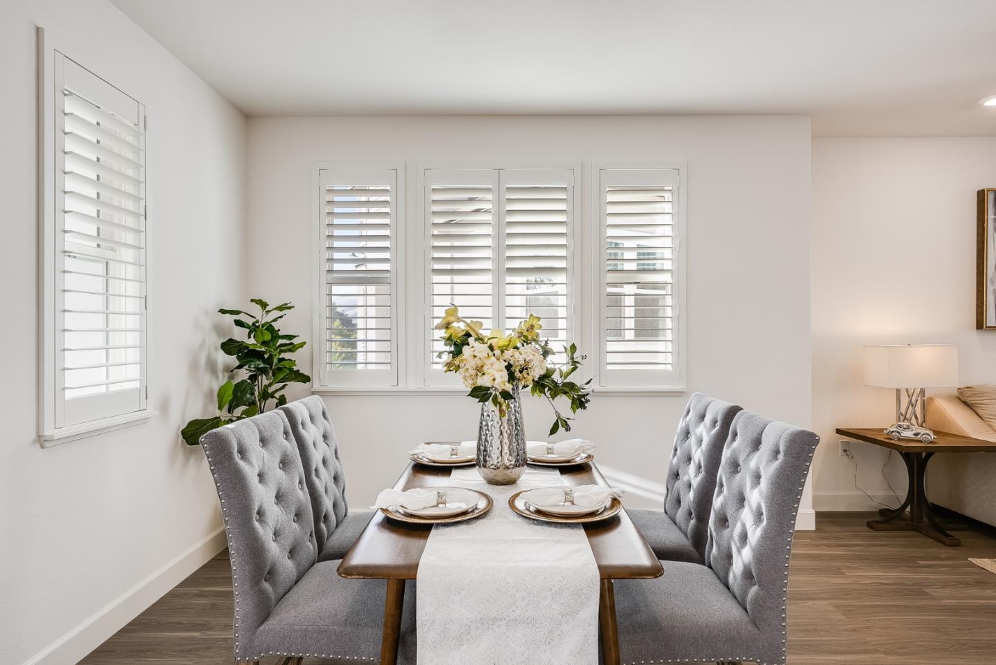 39478 Capstone Common Fremont, CA 94539 - Photo 10 of 33 a view of a dining room with furniture and wooden floor