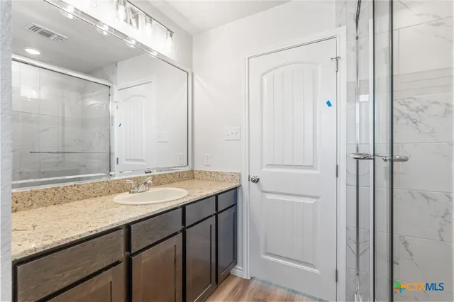 a view of backyard with trampoline