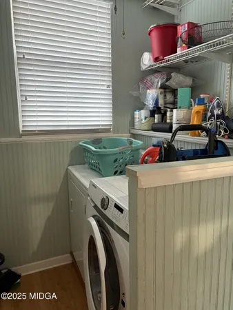 a utility room with dryer and washer