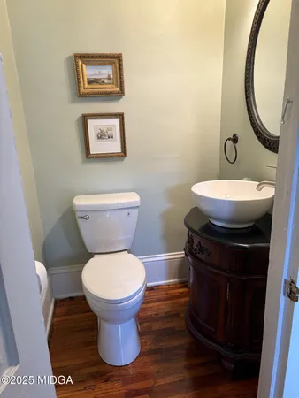 a bathroom with a toilet and a sink