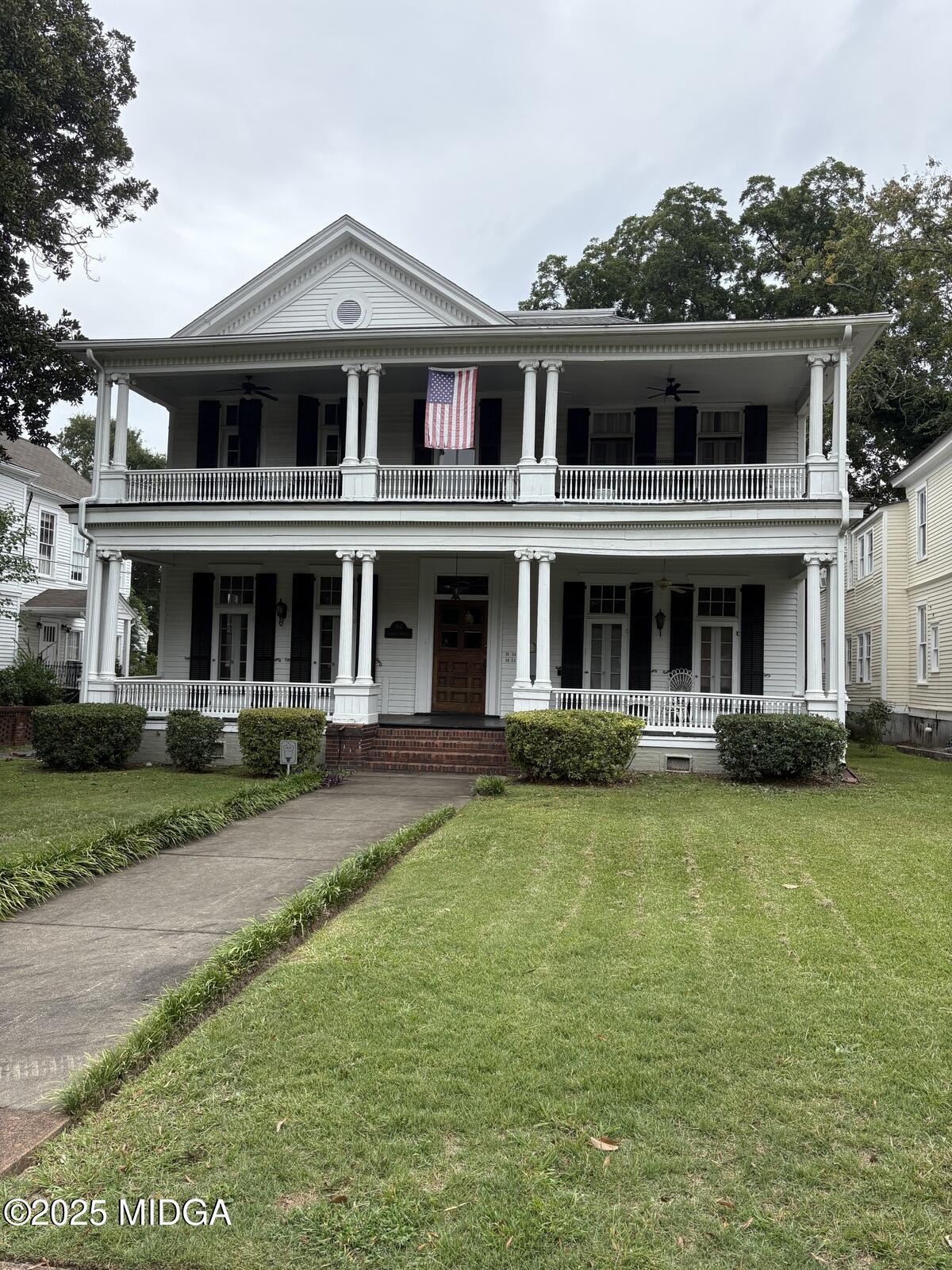 312 College Street, Unit 3 Macon, GA 31201 - Photo 23 of 24 a front view of a house with a yard