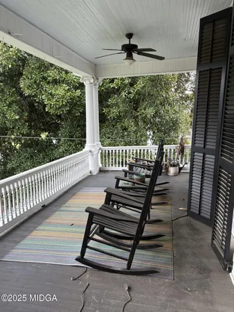 a view of a porch with furniture