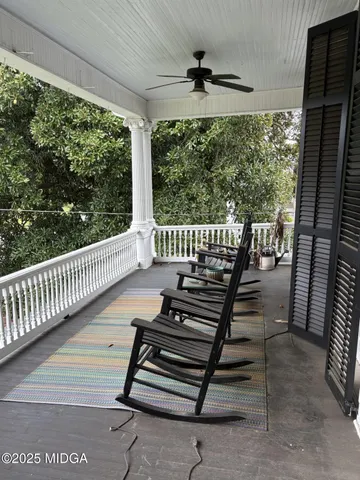 a view of a porch with furniture