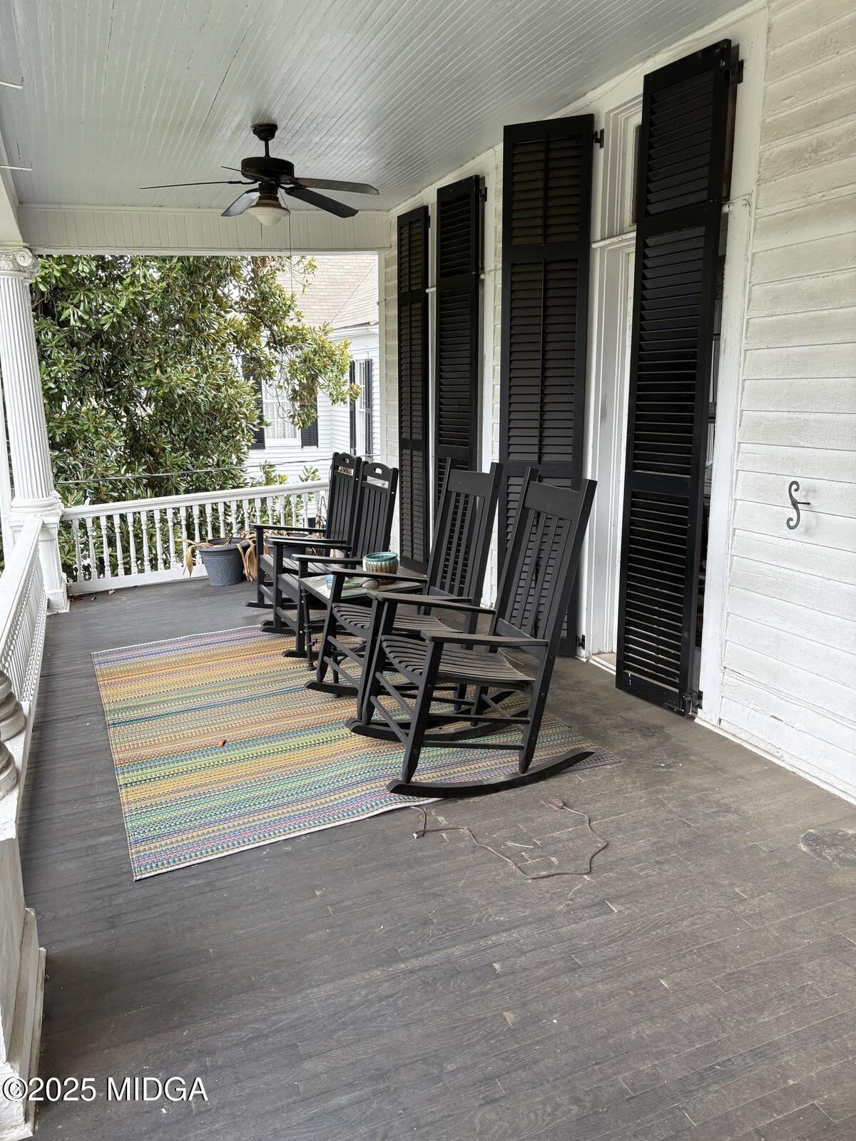 312 College Street, Unit 3 Macon, GA 31201 - Photo 4 of 24 a view of a chairs in balcony