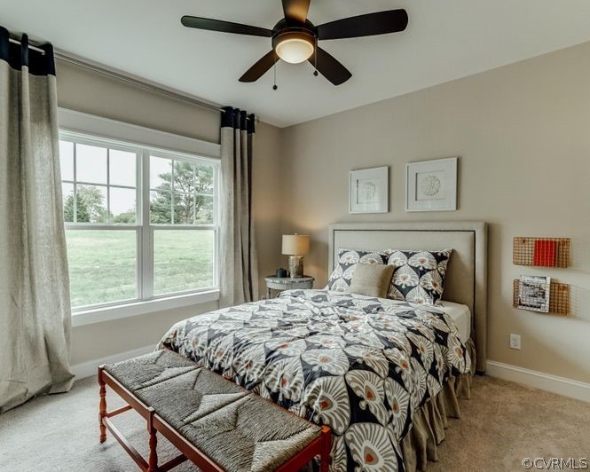 9112 Copplestone Road Chesterfield, VA 23832 - Photo 14 of 20 a bedroom with a bed and window