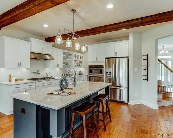 9112 Copplestone Road Chesterfield, VA 23832 - Photo 5 of 20 a kitchen with stainless steel appliances a sink stove and refrigerator