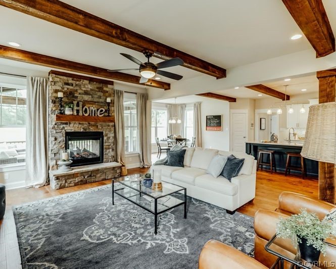 9112 Copplestone Road Chesterfield, VA 23832 - Photo 8 of 20 a living room with furniture and a fireplace