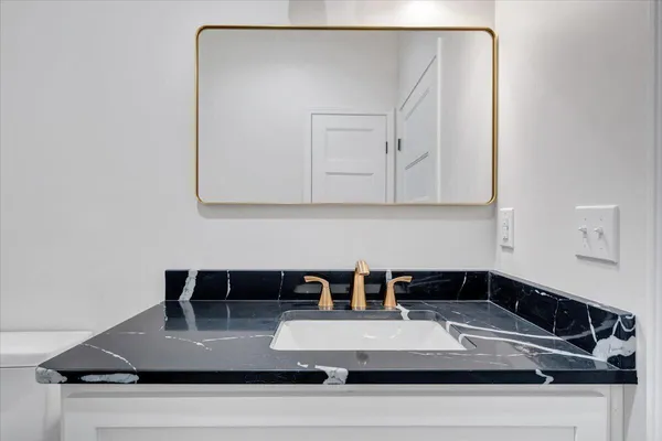 front view of a house and a yard