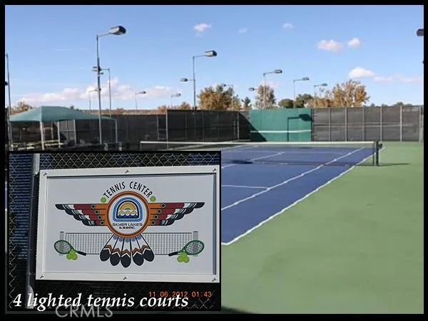 a kitchen with a table and chairs