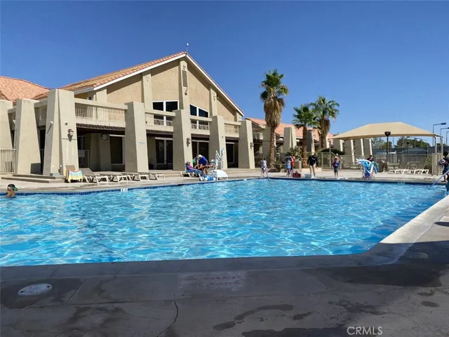 a front view of building with yard