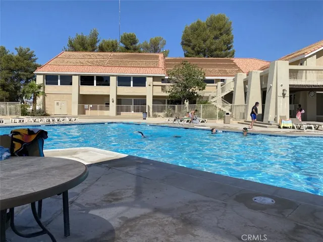 a front view of a house with swimming pool