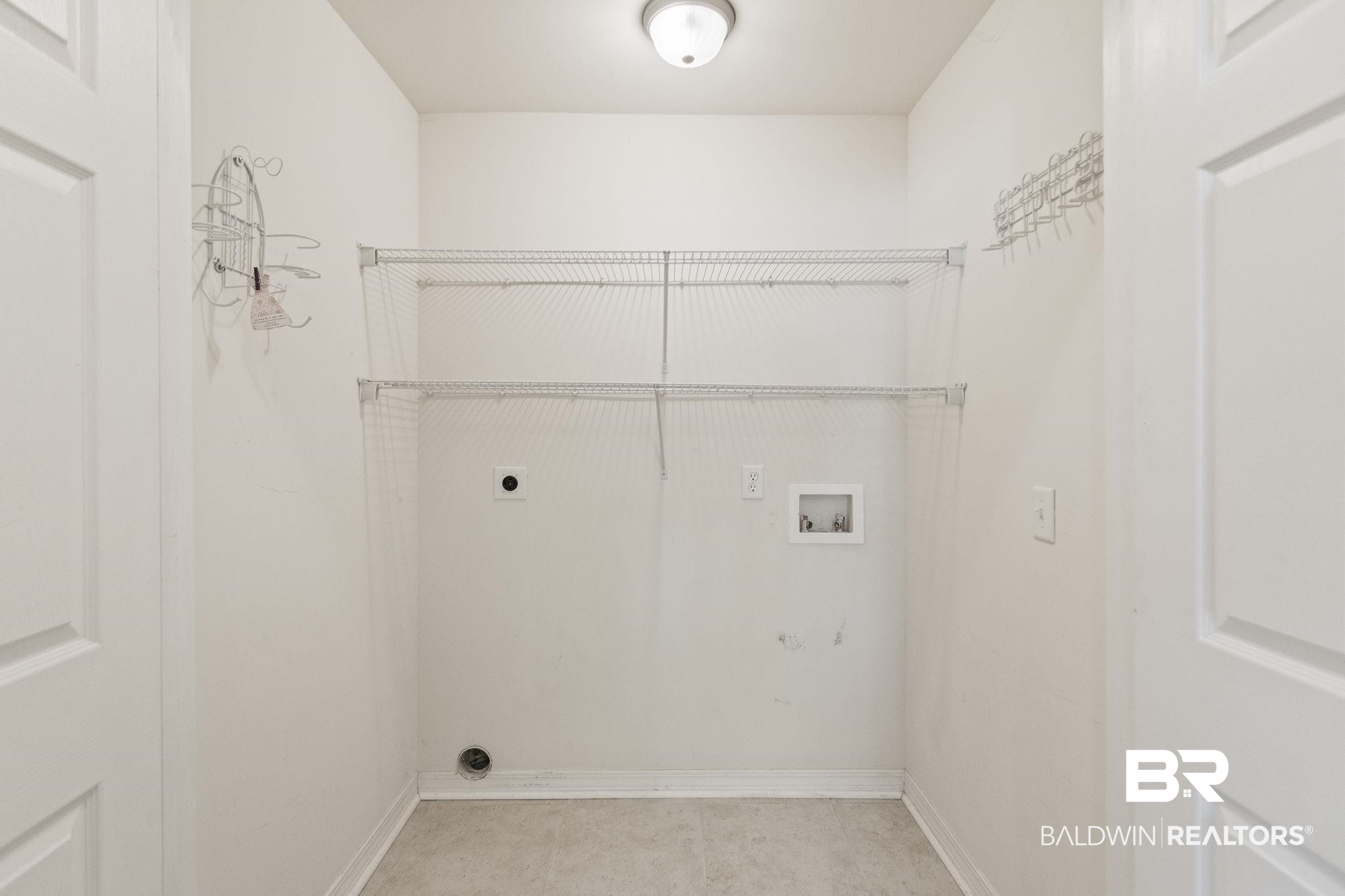 33156 Stables Drive, Unit 7B Daphne, AL 36527 - Photo 24 of 31 Laundry
