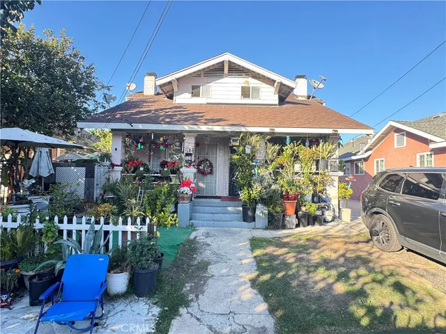 a front view of a house with a porch