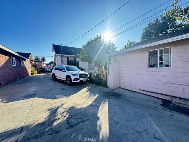 a house view with a backyard space