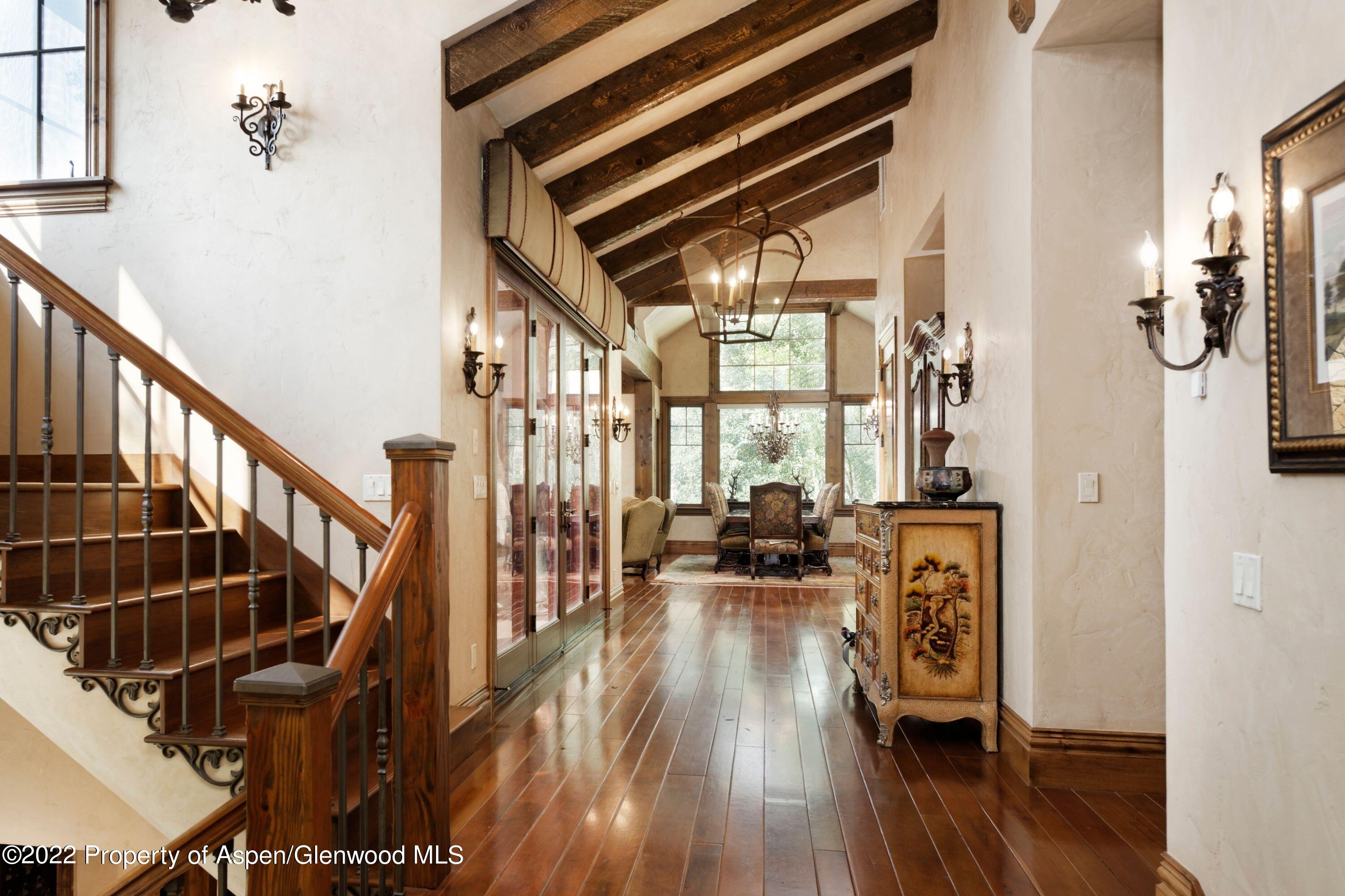 64 Spruce Ridge Lane Snowmass Village, CO 81615 - Photo 10 of 37 a view of a livingroom with wooden floor and furniture