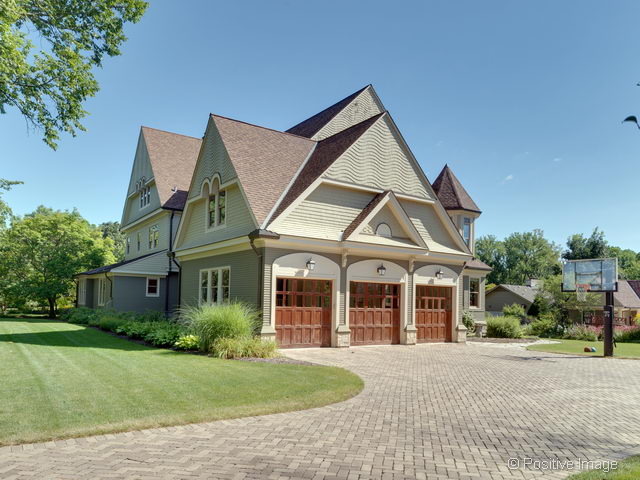 106 East 8th Street Hinsdale, IL 60521 - Photo 16 of 24 a front view of a house with a yard