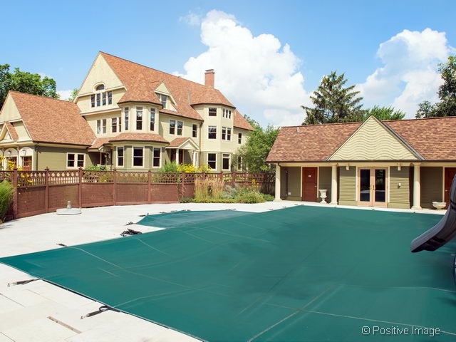 106 East 8th Street Hinsdale, IL 60521 - Photo 19 of 24 a front view of a house with a garden