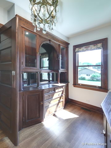 106 East 8th Street Hinsdale, IL 60521 - Photo 7 of 24 a view of a living room and kitchen with wooden floor