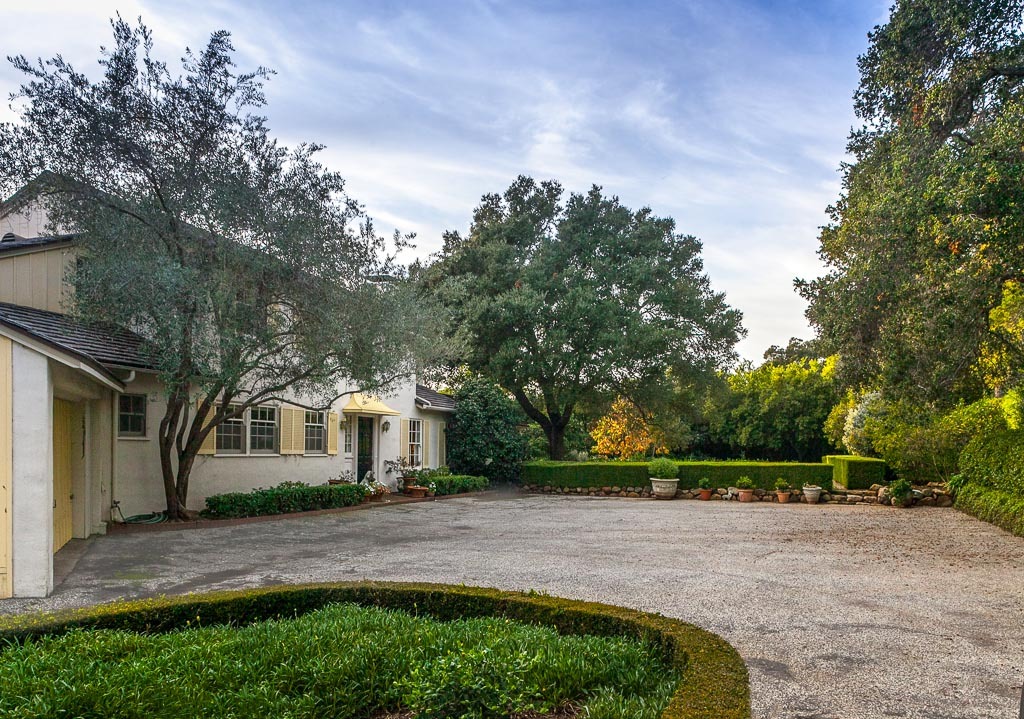 677 El Bosque Road Santa Barbara, CA 93108 - Photo 2 of 14 a front view of a house with garden