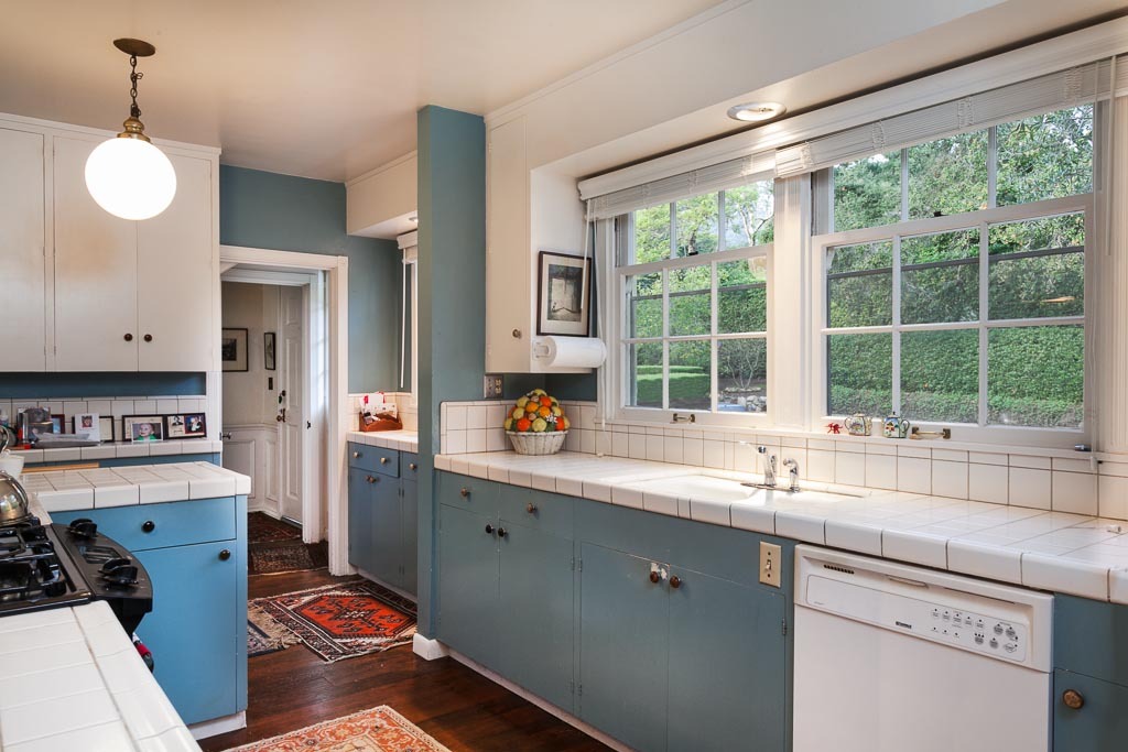 677 El Bosque Road Santa Barbara, CA 93108 - Photo 6 of 14 a kitchen with a sink window and cabinets