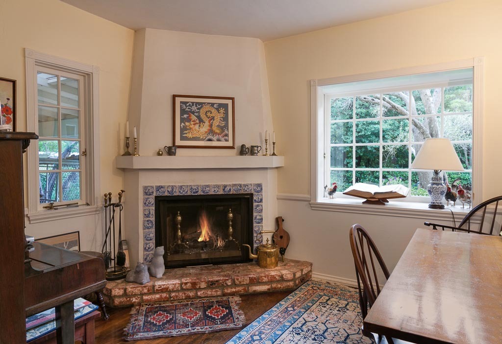 677 El Bosque Road Santa Barbara, CA 93108 - Photo 7 of 14 a living room with furniture and a fireplace