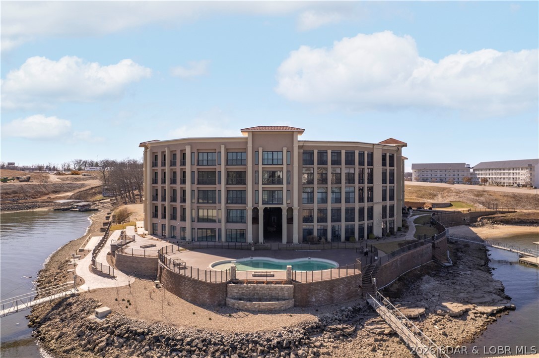 1184 Jeffries Road, Unit 519 Osage Beach, MO 65065 - Photo 21 of 58 Amenities include lakeside pool, club house, gym,