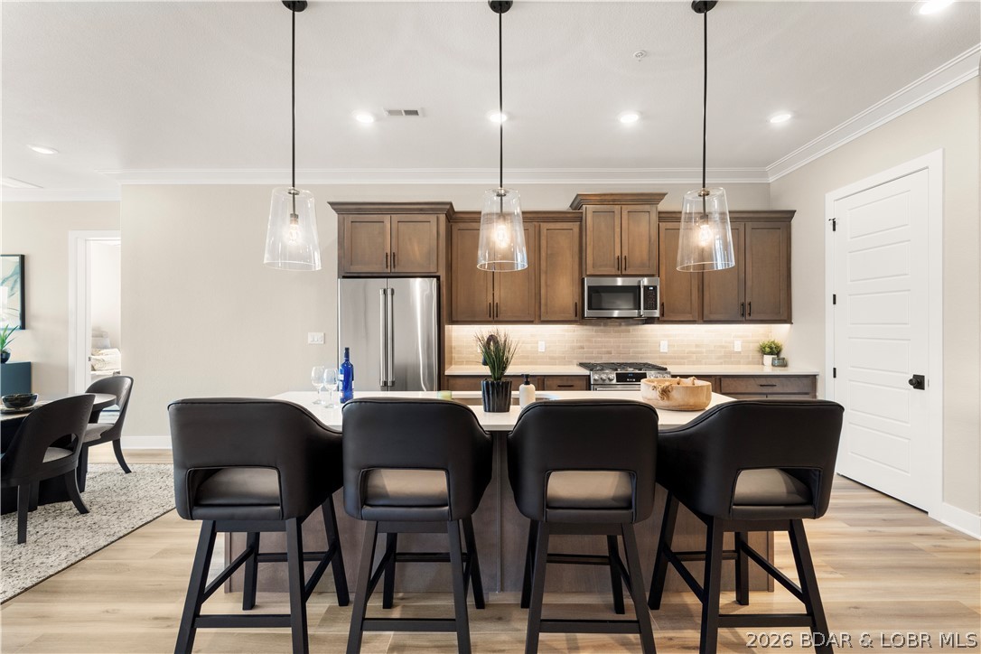 1184 Jeffries Road, Unit 519 Osage Beach, MO 65065 - Photo 23 of 58 Breakfast bar seating for four.