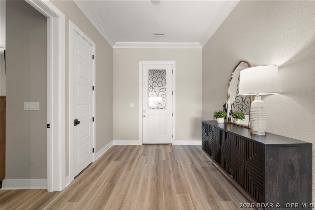 1184 Jeffries Road, Unit 519 Osage Beach, MO 65065 - Photo 4 of 58 Step inside and you're instantly greeted by a spac