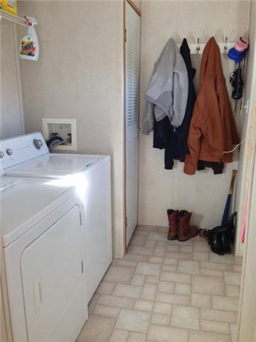 3423 Morgan Road Rockvale, TN 37153 - Photo 14 of 20 Laundry room has access to side entrance deck and washer & dryer stay!