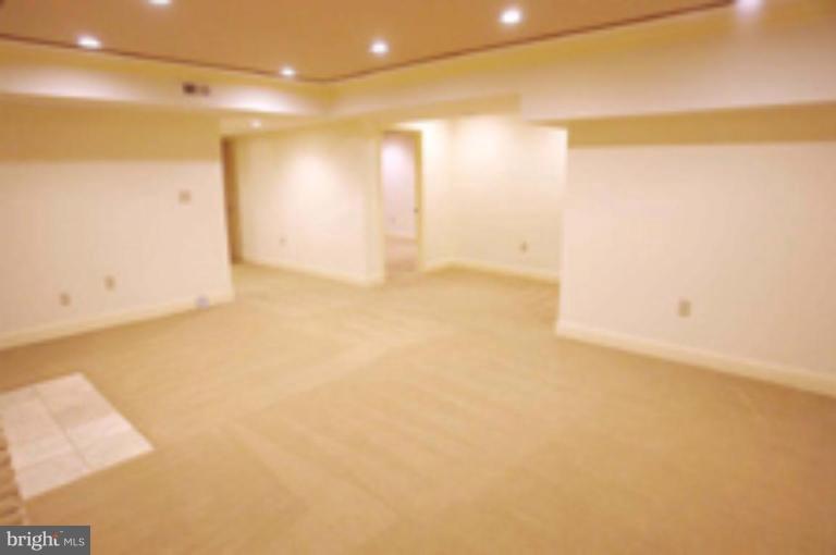 21815 Woodfield Road Gaithersburg, MD 20882 - Photo 21 of 29 Rec room has a kitchenette and storage room!