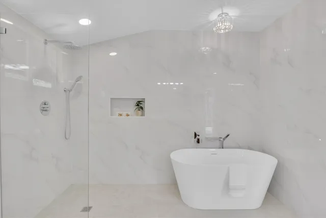 a room with furniture pool table and windows