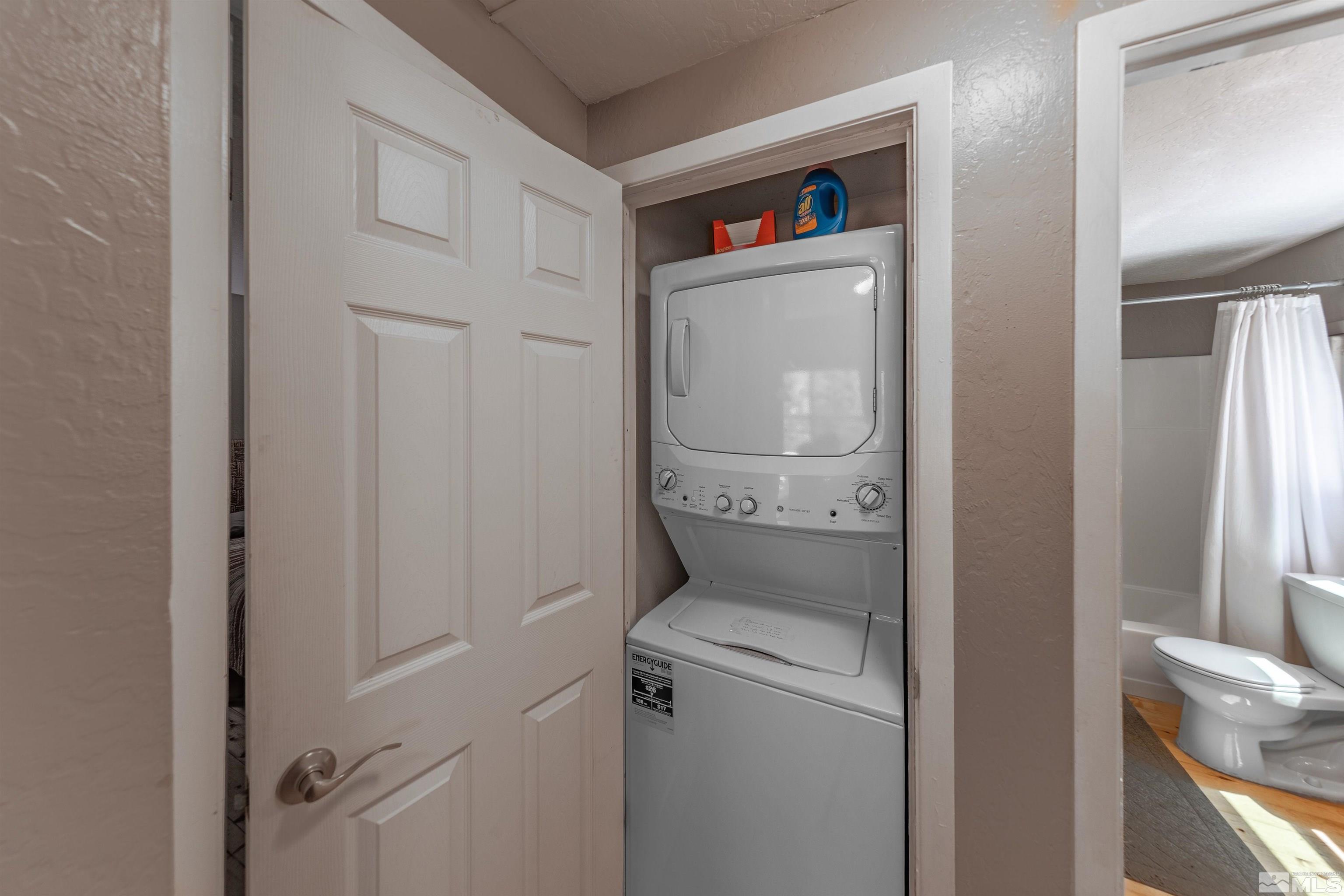 181 Tramway Drive, Unit B Stateline, NV 89449 - Photo 11 of 27 a room with a washer and dryer