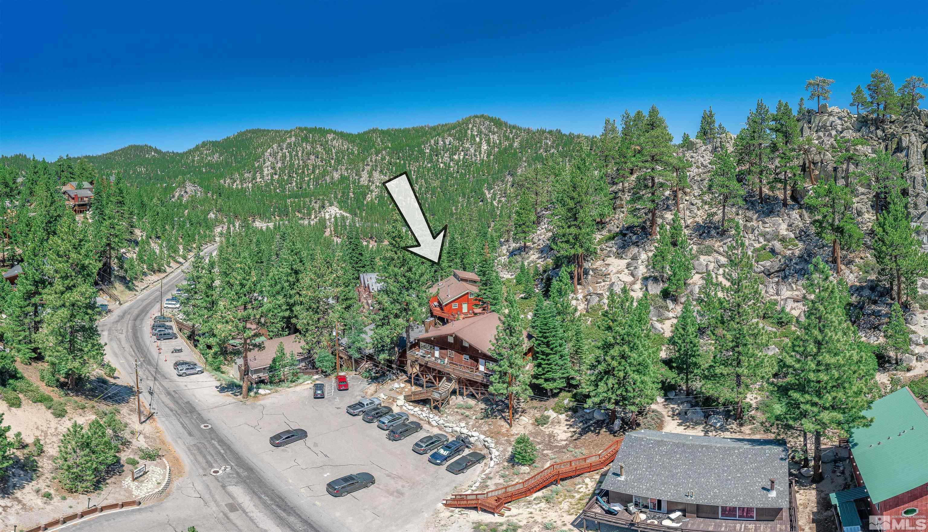 181 Tramway Drive, Unit B Stateline, NV 89449 - Photo 17 of 27 an aerial view of a house with a yard