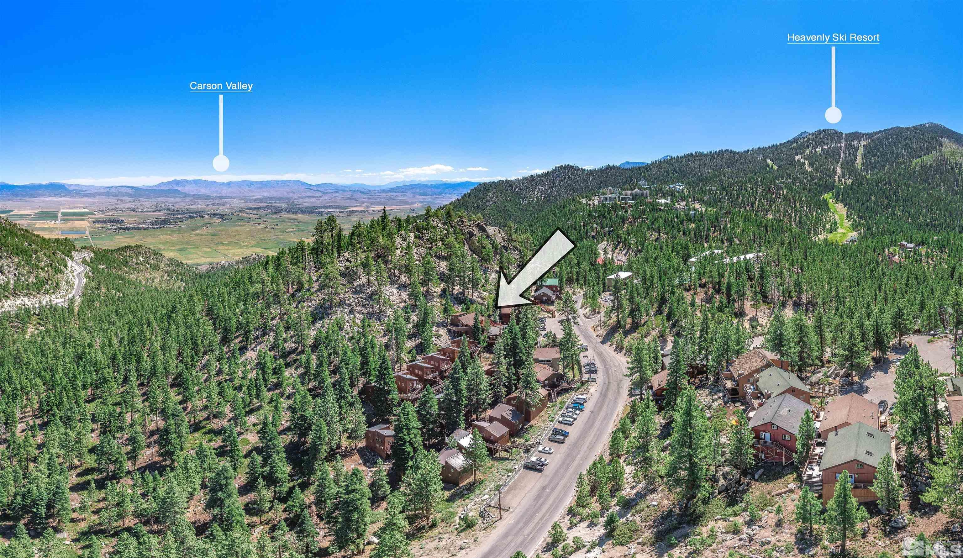 181 Tramway Drive, Unit B Stateline, NV 89449 - Photo 21 of 27 a view of a city with mountains in the background