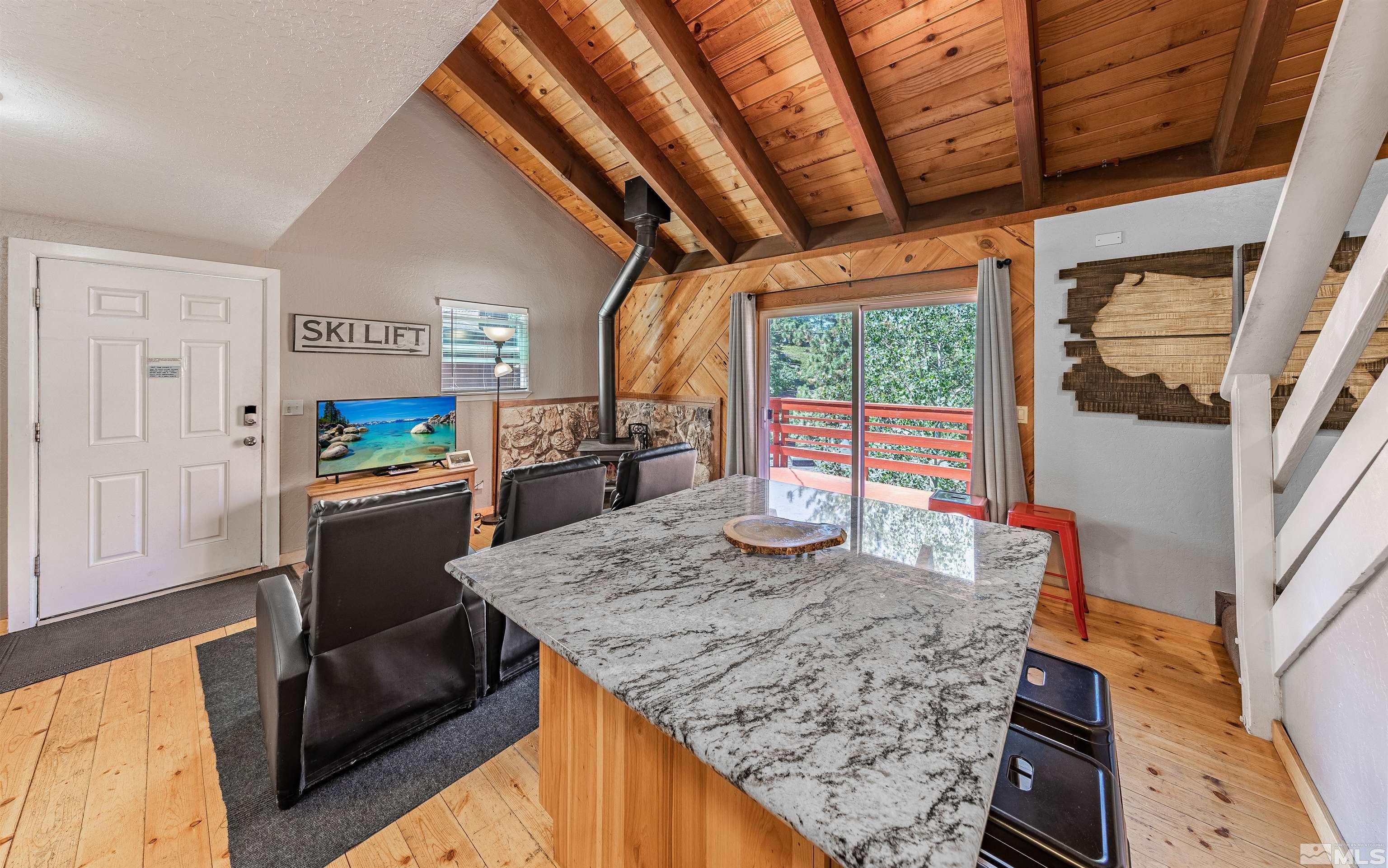 181 Tramway Drive, Unit B Stateline, NV 89449 - Photo 5 of 27 a kitchen with stainless steel appliances granite countertop sink stove and refrigerator