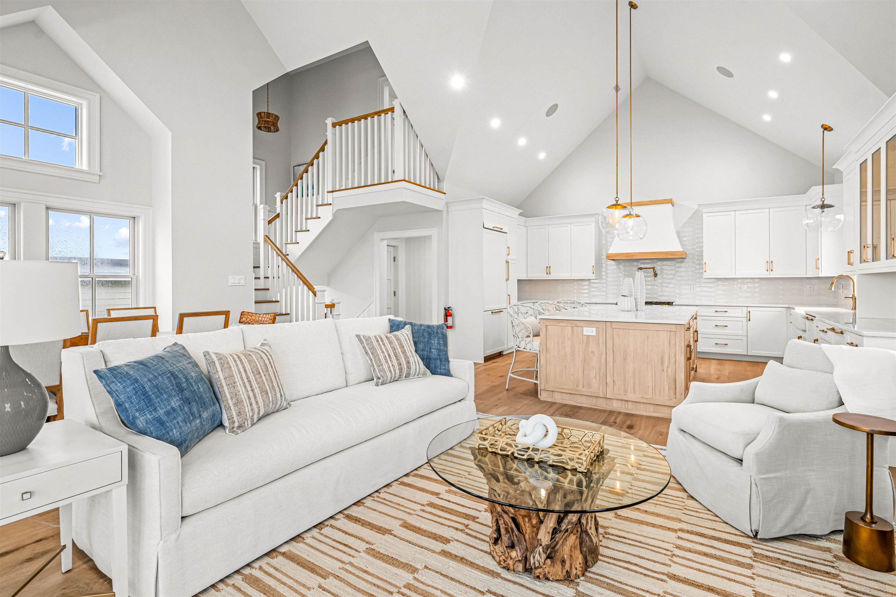 1819 Dune Drive Avalon, NJ 08202 - Photo 25 of 49 a living room with furniture kitchen and a chandelier