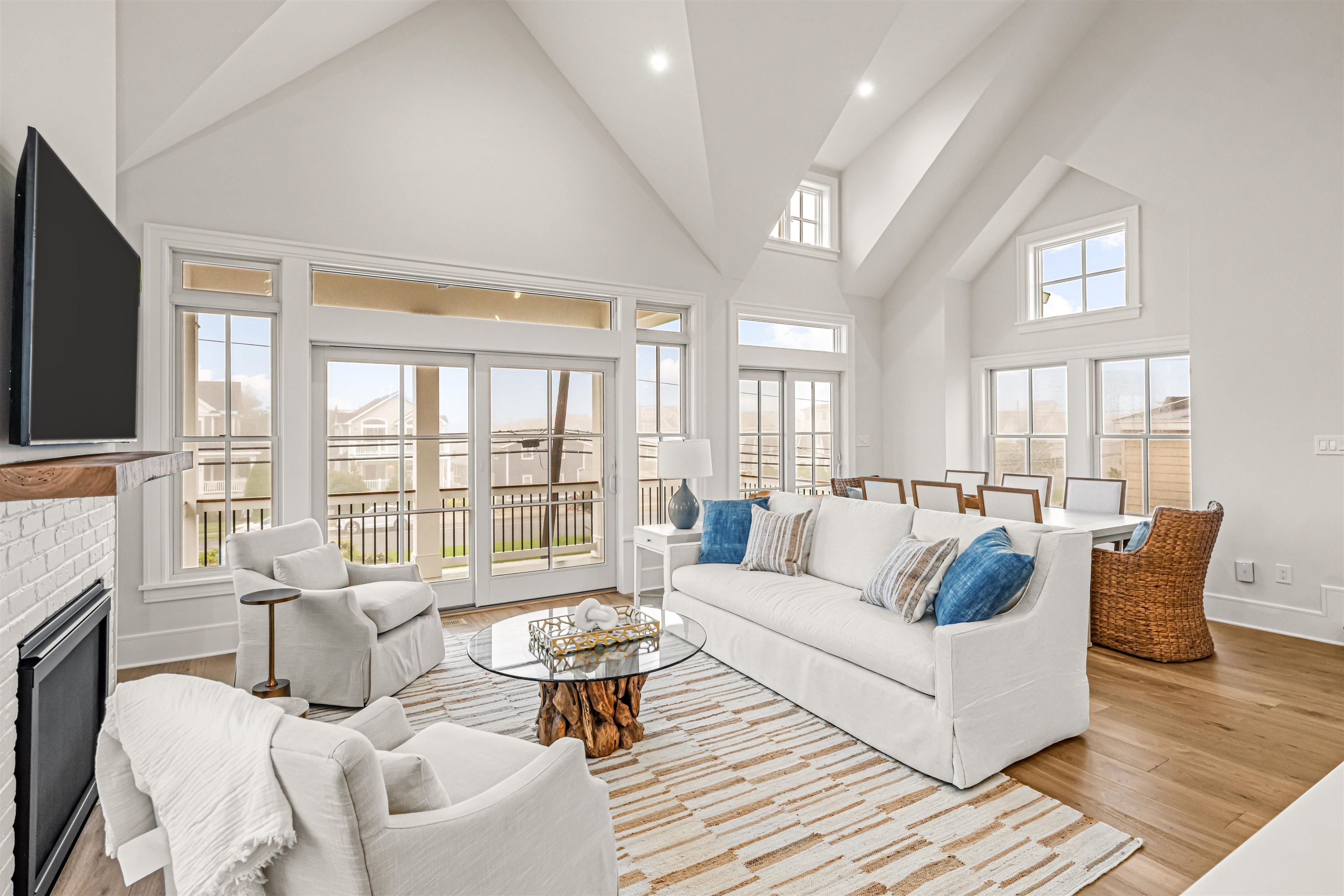 1819 Dune Drive Avalon, NJ 08202 - Photo 27 of 49 a living room with furniture and a flat screen tv