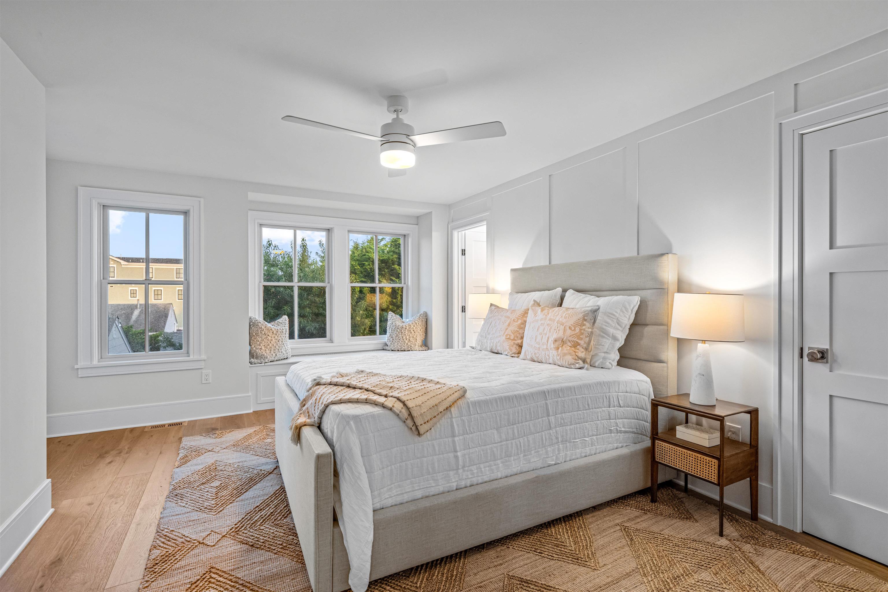 1819 Dune Drive Avalon, NJ 08202 - Photo 38 of 49 a large bedroom with a bed and wooden floor