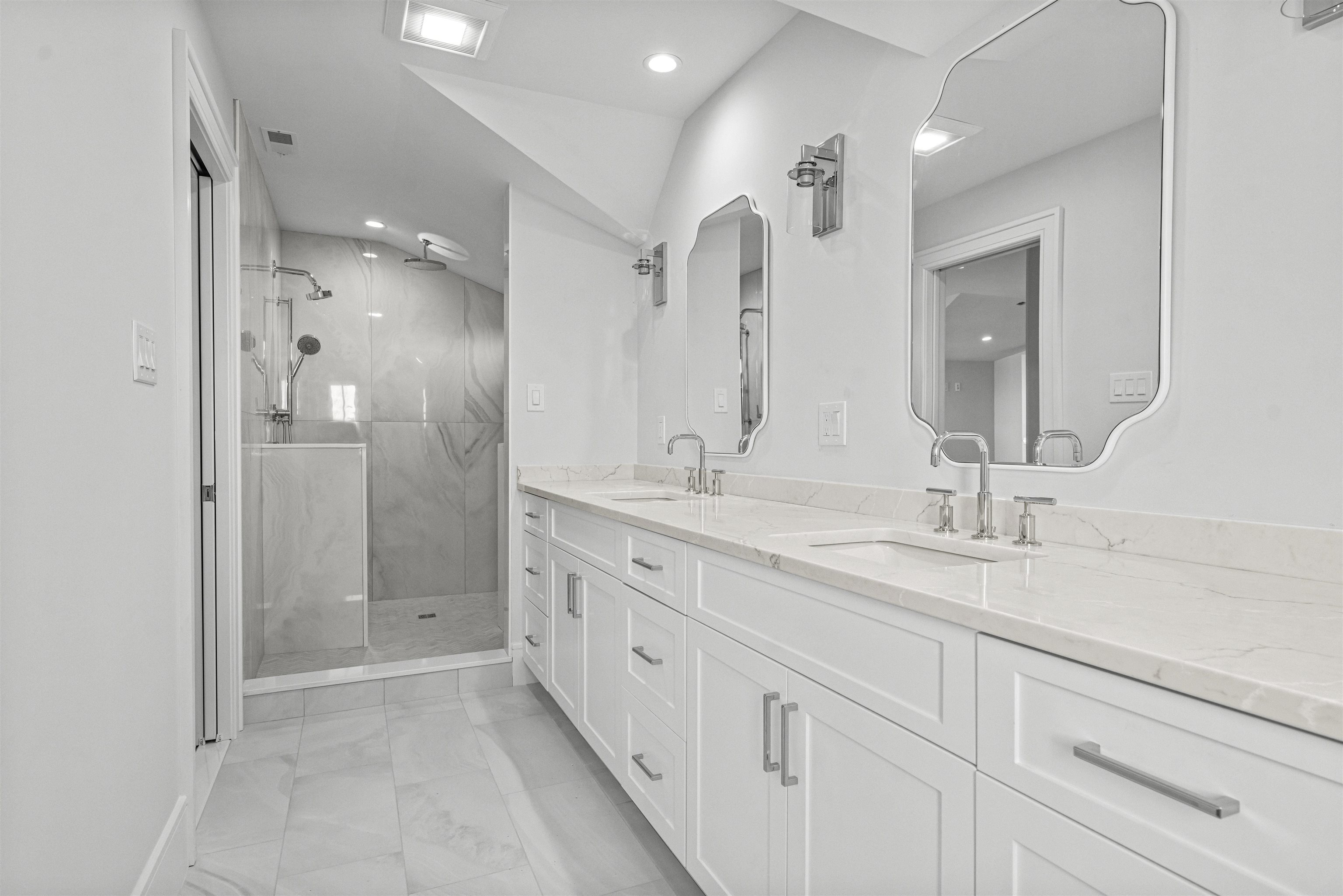 1819 Dune Drive Avalon, NJ 08202 - Photo 45 of 49 a spacious bathroom with a granite countertop sink mirror and double